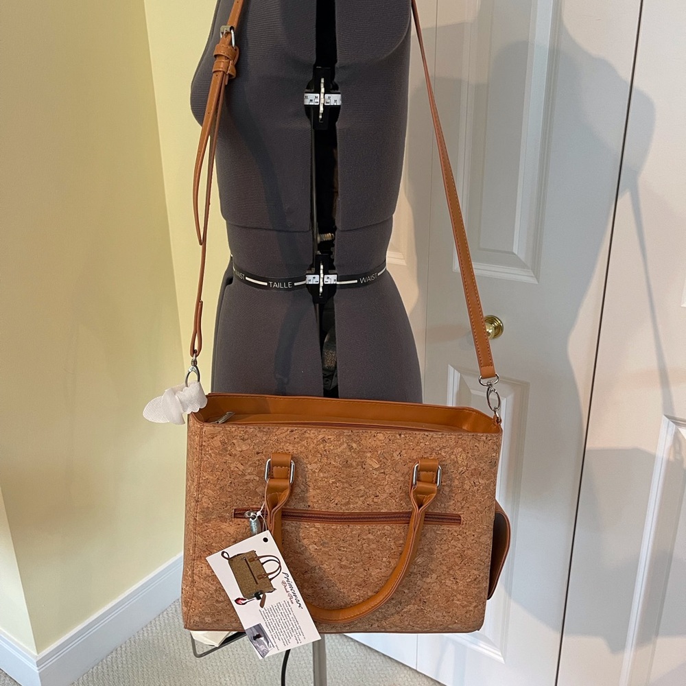 NWT… drink purse.  Take your wine and go anywhere you like.
